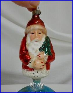 Vintage Santa Claus Standing on Ball Christmas Glass Ornament 81970